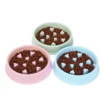 Gamelle pour chat anti glouton, design cœur, idéale pour une alimentation saine.